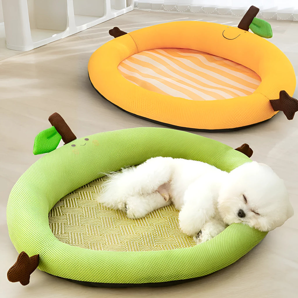 Green pet bed with fruit-shaped backrest and raised edges, shown in large size
