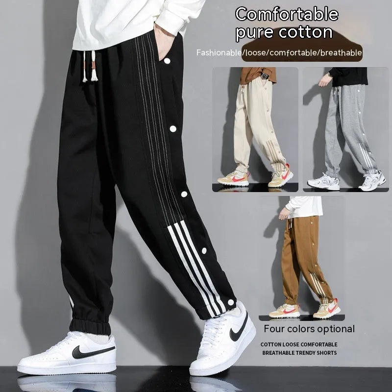 Men's loose fit cotton blend sweatpants with ankle ties and drawstring waistband in black colour