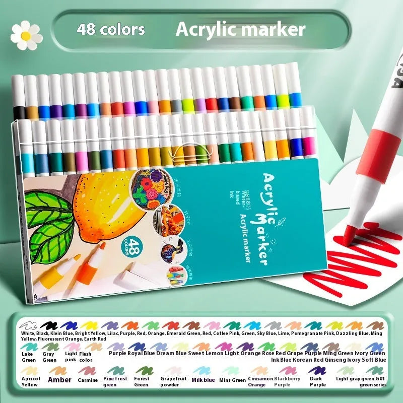 Box of acrylic marker pens for student colour painting showing multiple colour options