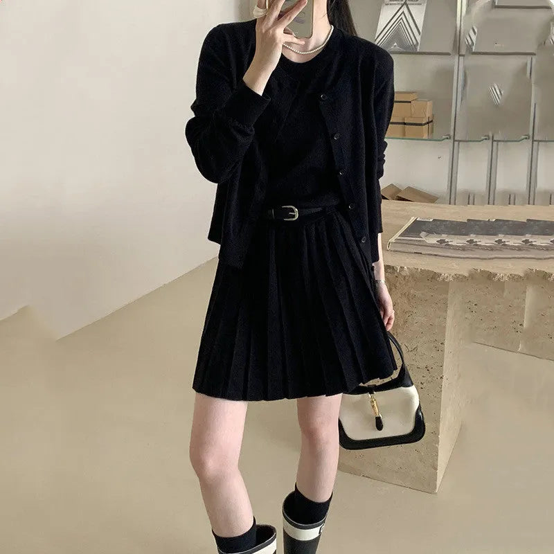 Women's grey Art retro style two-piece set with long-sleeved cardigan and pleated vest skirt featuring a belt