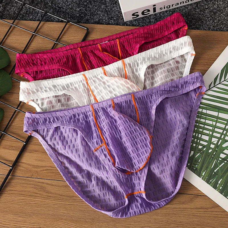 Men's low waist briefs in solid colour with ice silk fabric and lace trim details
