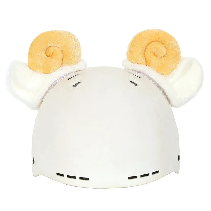 Cute cartoon plush fabric hat cover on a ski helmet for decoration.