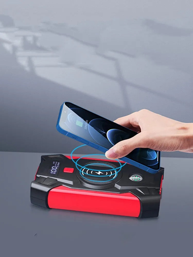 Red car emergency battery starter with digital display and air pump accessory
