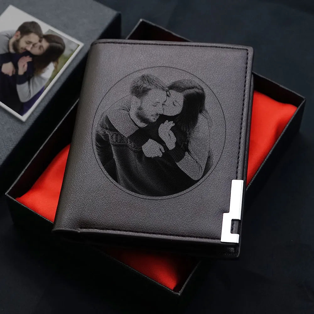 Leather men's wallet with zip closure, shown individually packaged.