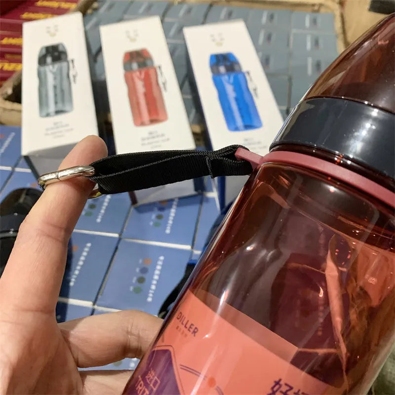 Chinese style portable sports water cup with separate tea compartment, shown in blue, red, black, and grey colour options.
