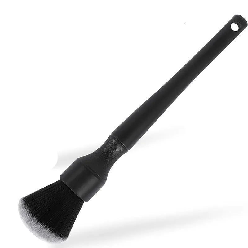 Black car detailing brush with super soft pig hair bristles for interior cleaning, shown in two size options