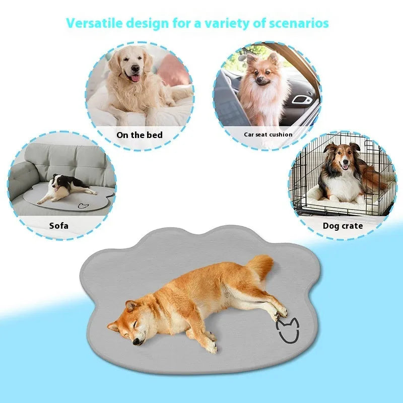 Dog cooling mat made of ice silk in a dog head shape, shown in light grey on a wooden floor.