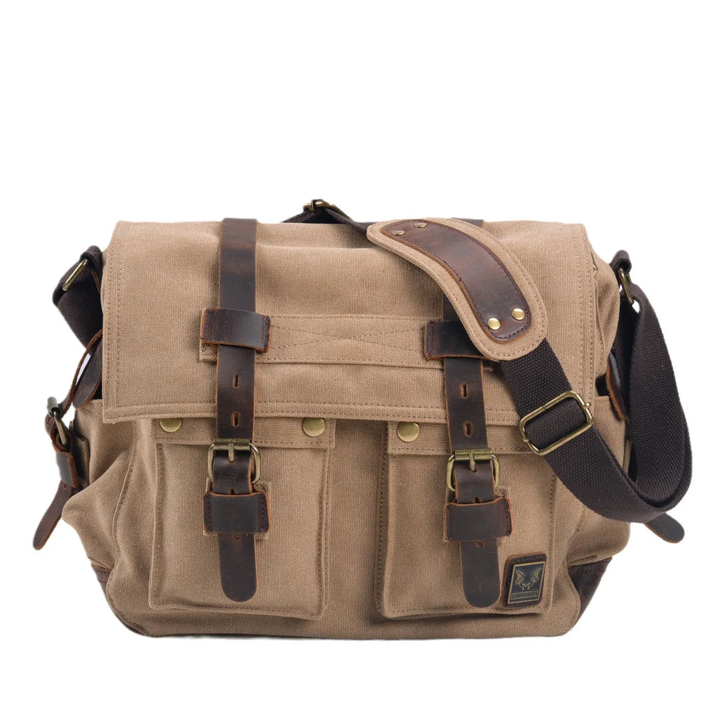 Men's canvas crossbody shoulder bag with cowhide trim showing internal organisers