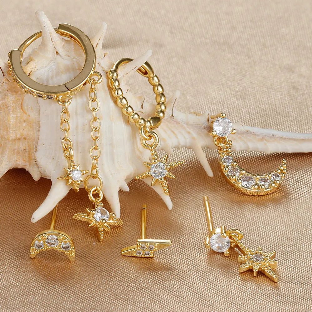 XINGX gold electroplated chain tassel earrings set with six pieces showing zircon stud details on copper earrings