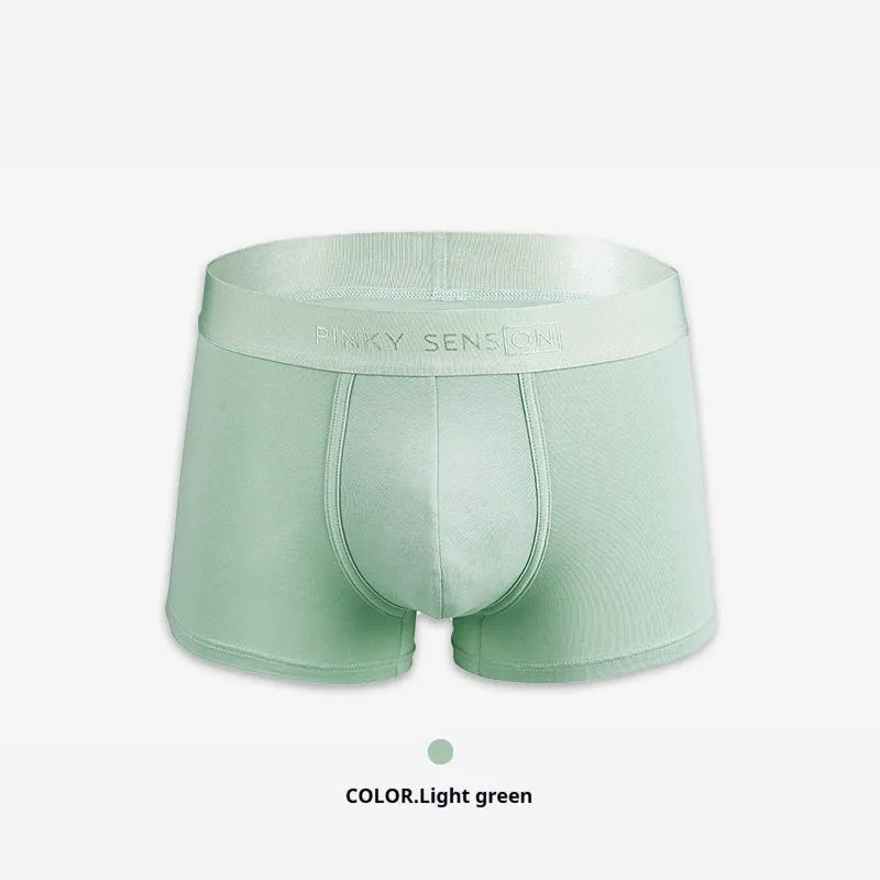 Men's solid colour cotton boxer shorts in black, white, silver grey or light green.
