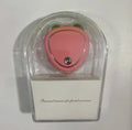 Micro-current beauty instrument in pink with control buttons and compact handheld design