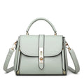 Women's soft PU leather messenger shoulder bag in square vertical design showing black, red, green and blue colour options