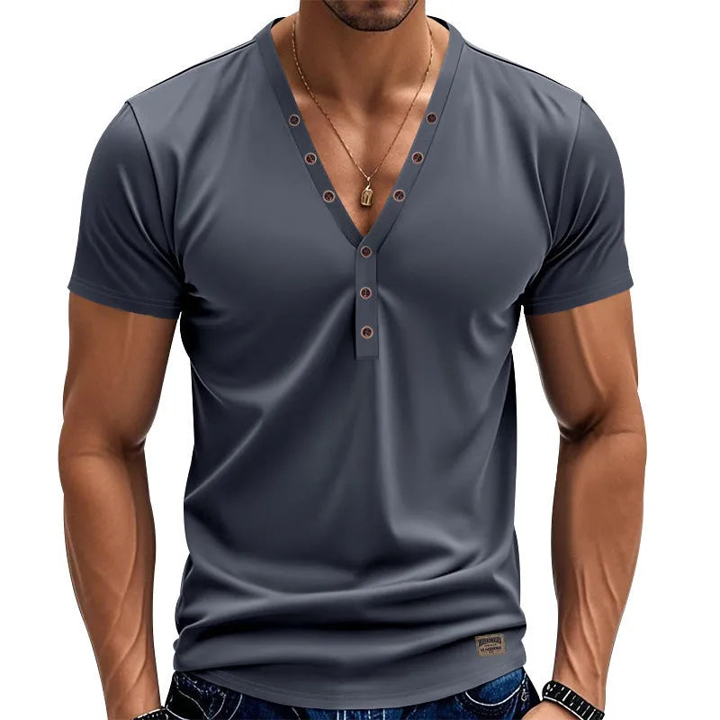 Man wearing a loose fit light blue V-neck button-up sport shirt