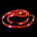 Luminous PVC dog collar and leash in fluorescent green with hand strap, showing 25cm width