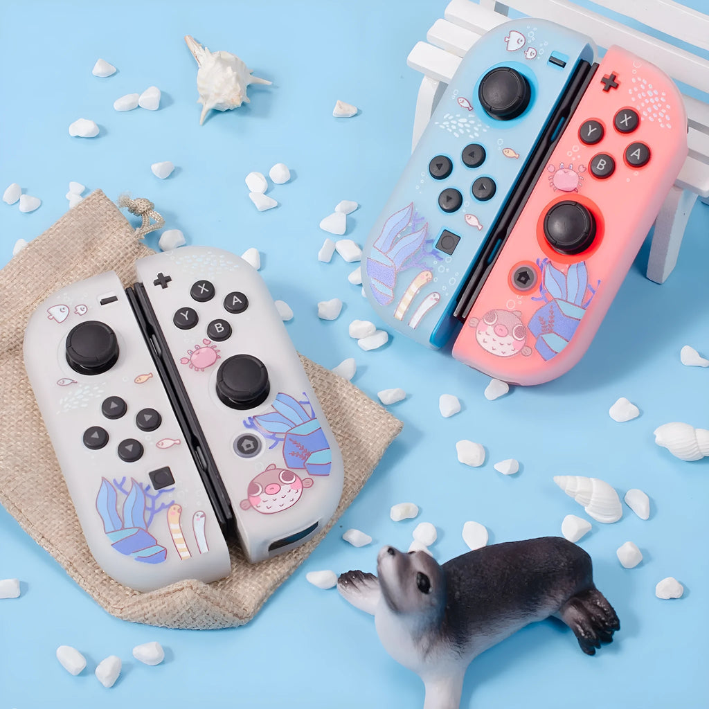 Transparent Nintendo Switch OLED protective case with seabed exploration themed packaging box