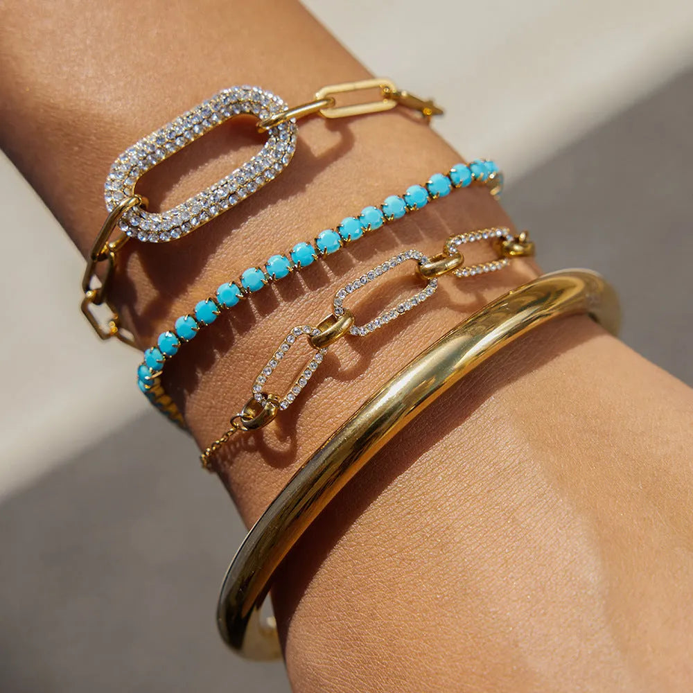Women's stainless steel bracelet with electroplated finish, geometric round shape on a woman's wrist