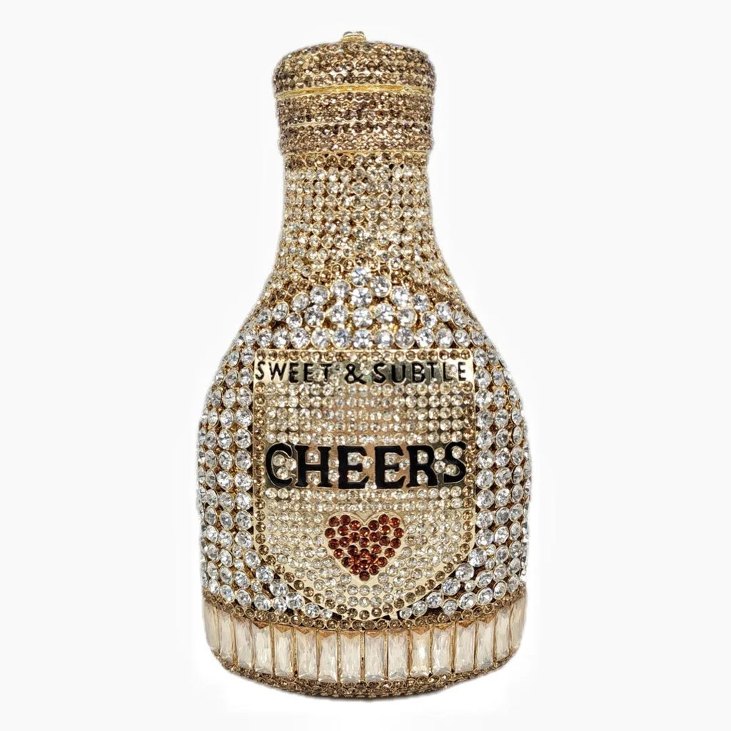 Gold hard alloy evening clutch shaped like a champagne bottle with synthetic leather lining
