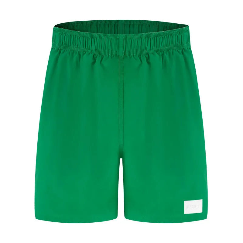 Men's solid colour quick-drying nylon sports shorts on a size chart
