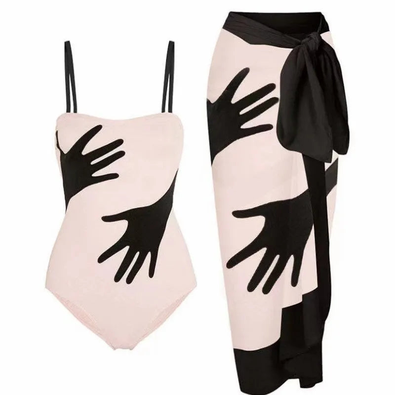 A women's one-piece bikini swimsuit with a gauze skirt, shown in a colour option.
