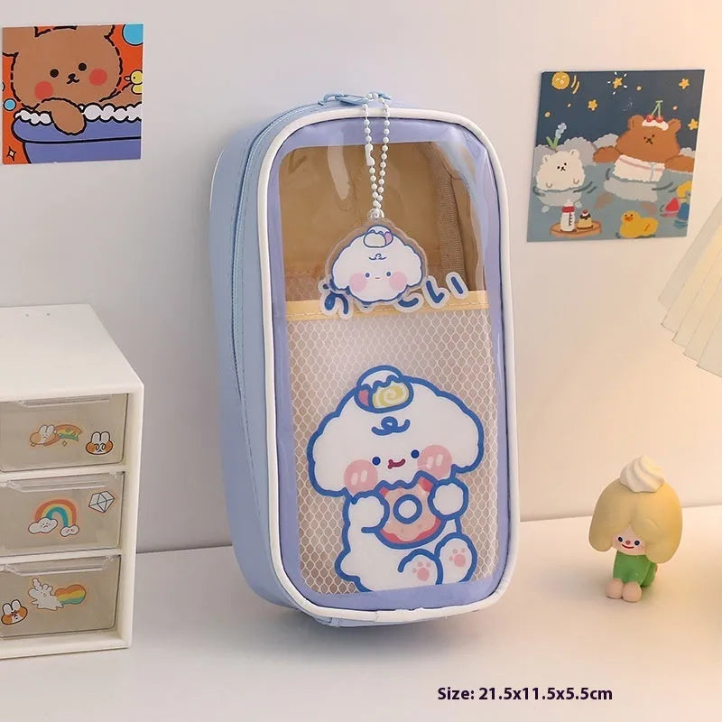Transparent PVC pencil case with cartoon design showing large capacity interior and zipper closure
