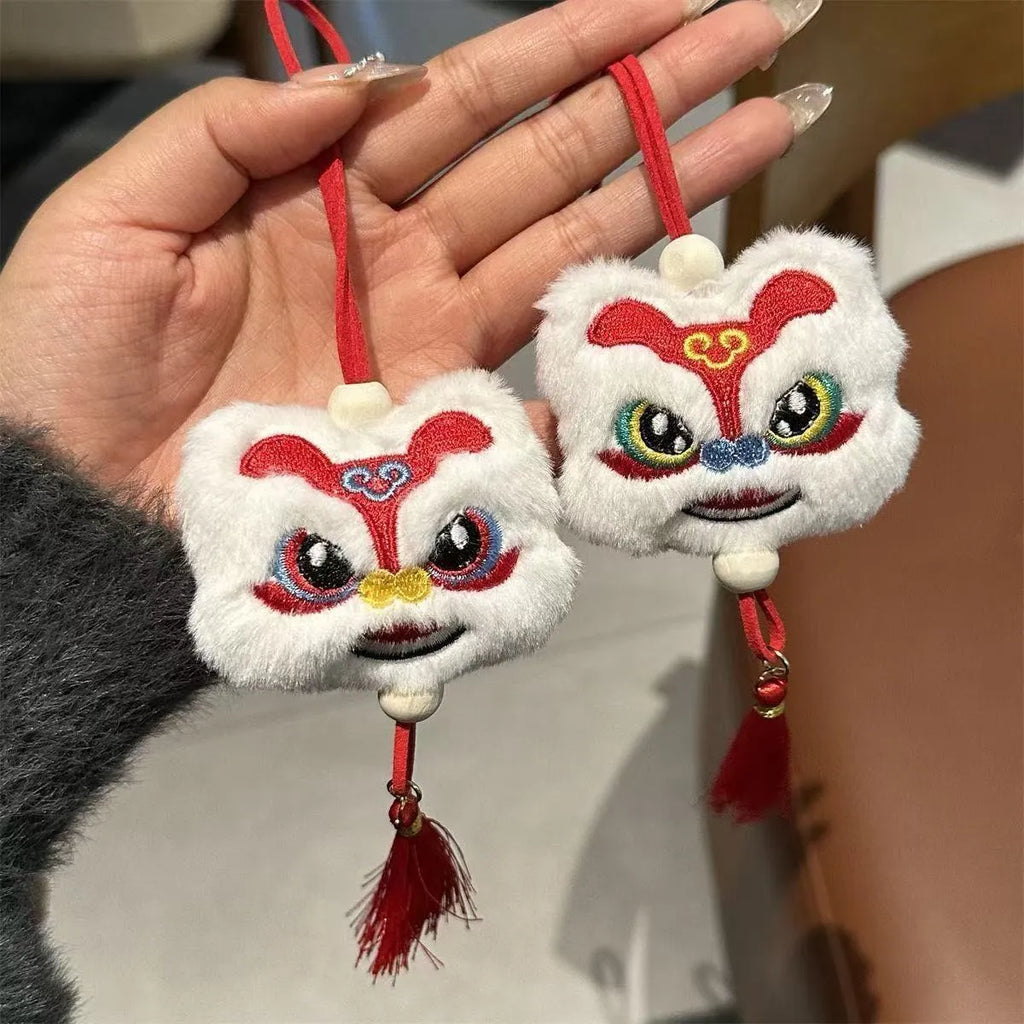 Blue handmade plush lion tassel keychain ornament with star stone detail