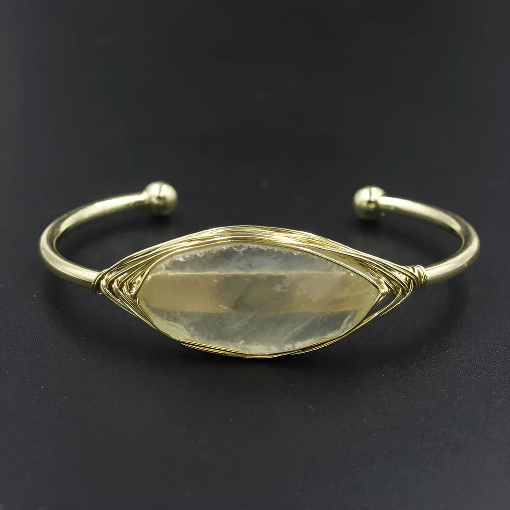 Natural raw gemstone crystal bracelet showing 8mm winding design with simple opening clasp in amethyst colour