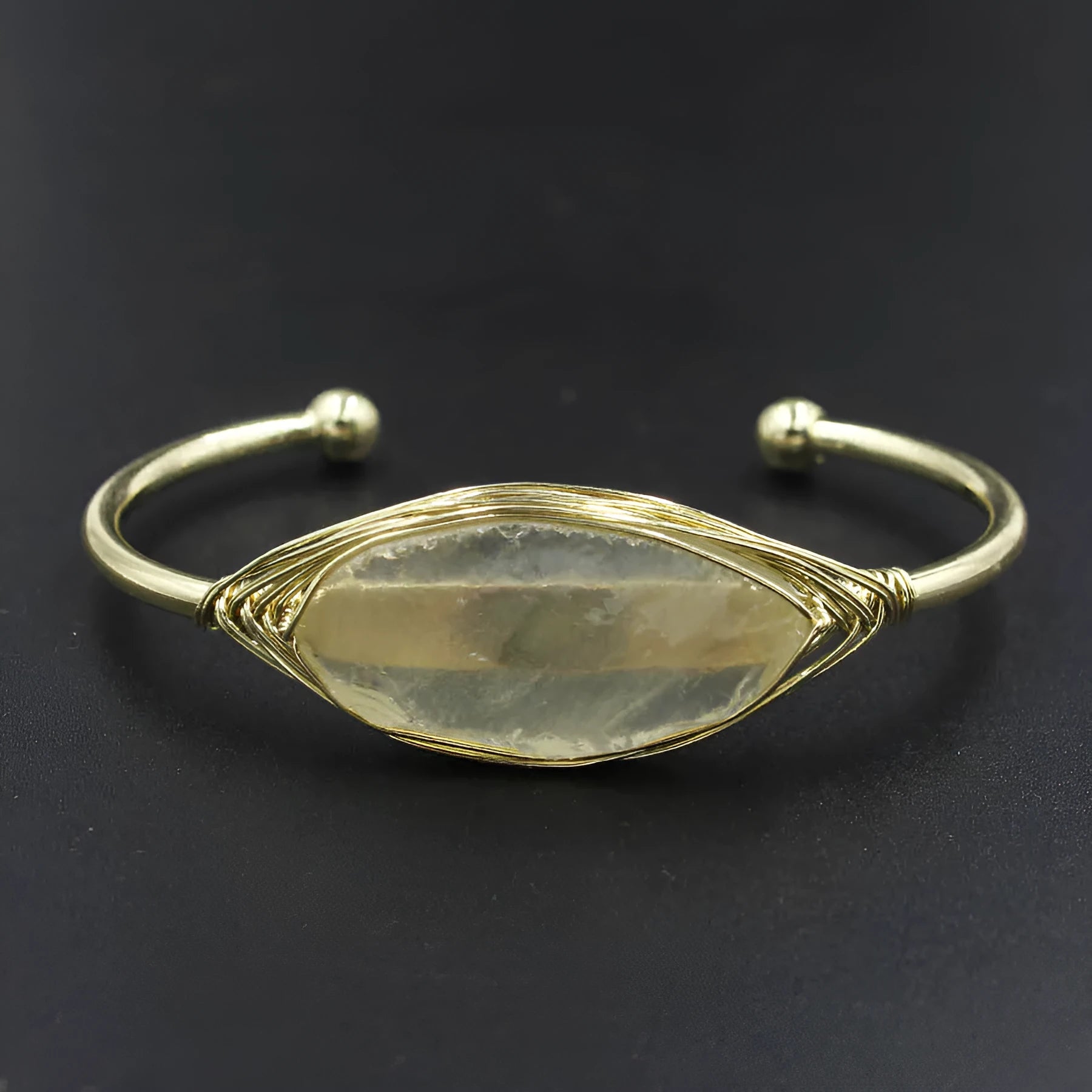 Natural raw gemstone crystal bracelet showing 8mm winding design with simple opening clasp in amethyst colour