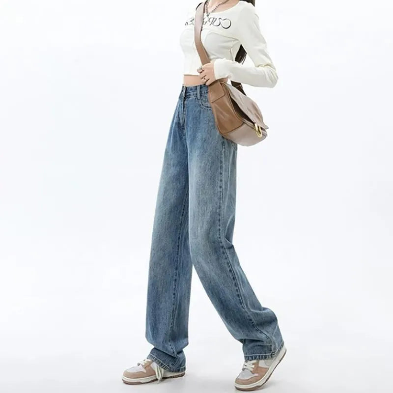 Women's high waist wide leg jeans in retro blue denim with straight leg cut
