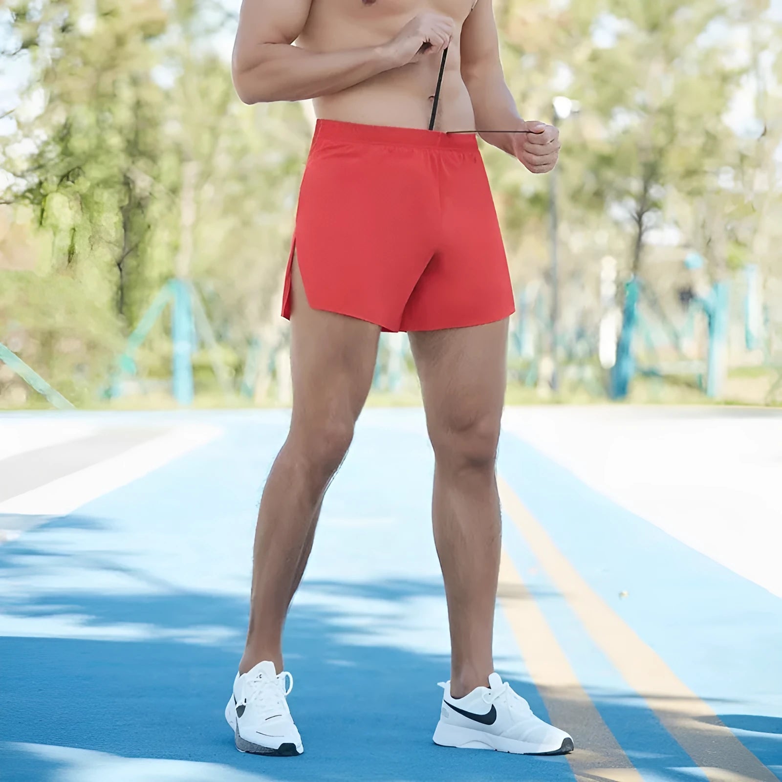 Men's loose fit off-road running shorts in black, shown for marathon and cross-country running
