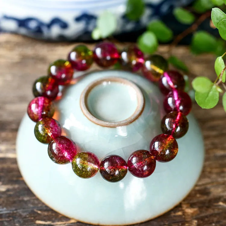 Women's watermelon crystal bracelet showing four size options from 6mm to 12mm diameter