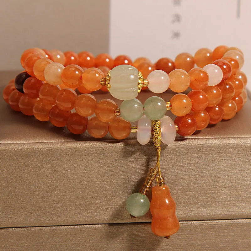 Artistic antique natural Jinsi Jade multi-layer bracelet with pumpkin beads and calabash pendant on white background