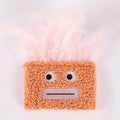 Blue plush cat toy shaped like a big mouth explosion head with catnip inside.