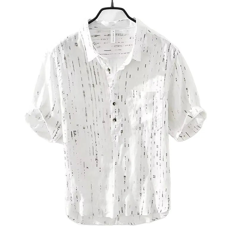 Men's loose fit short-sleeved polo shirt with lapel collar in black, laid flat.