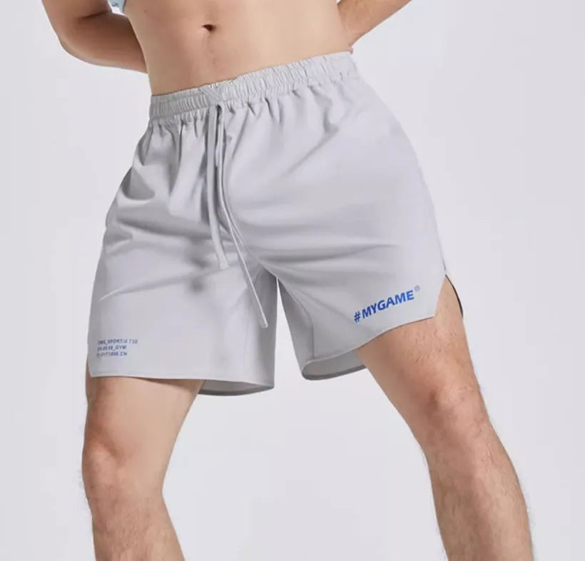 Men's fitness training shorts in black, blue, grey, or white with moisture-wicking fabric.