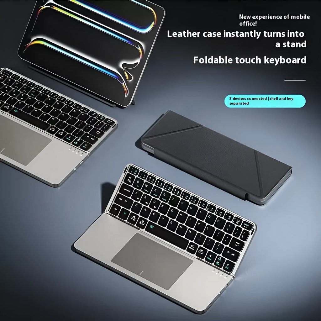 Grey folding Bluetooth keyboard shown both open and closed, next to mobile phone
