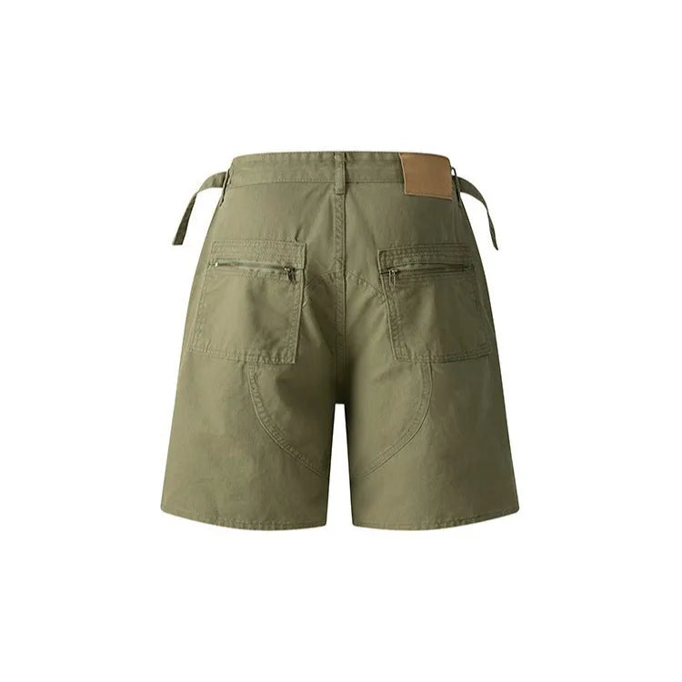 Retro washed cotton workwear shorts in loose fit with zipper, shown in grey, green, camouflage, and blue colour options.