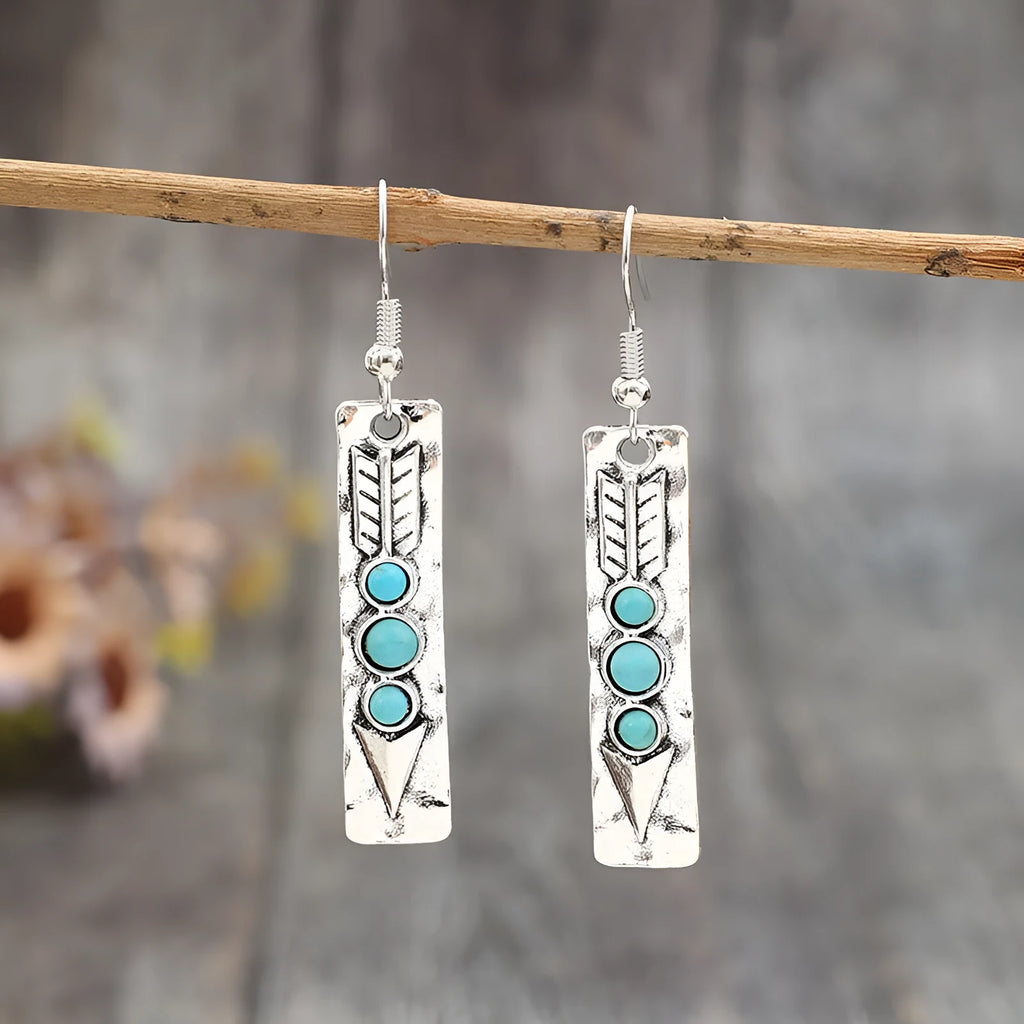 Silver geometric long strip earrings with turquoise inlay detailing and retro styling