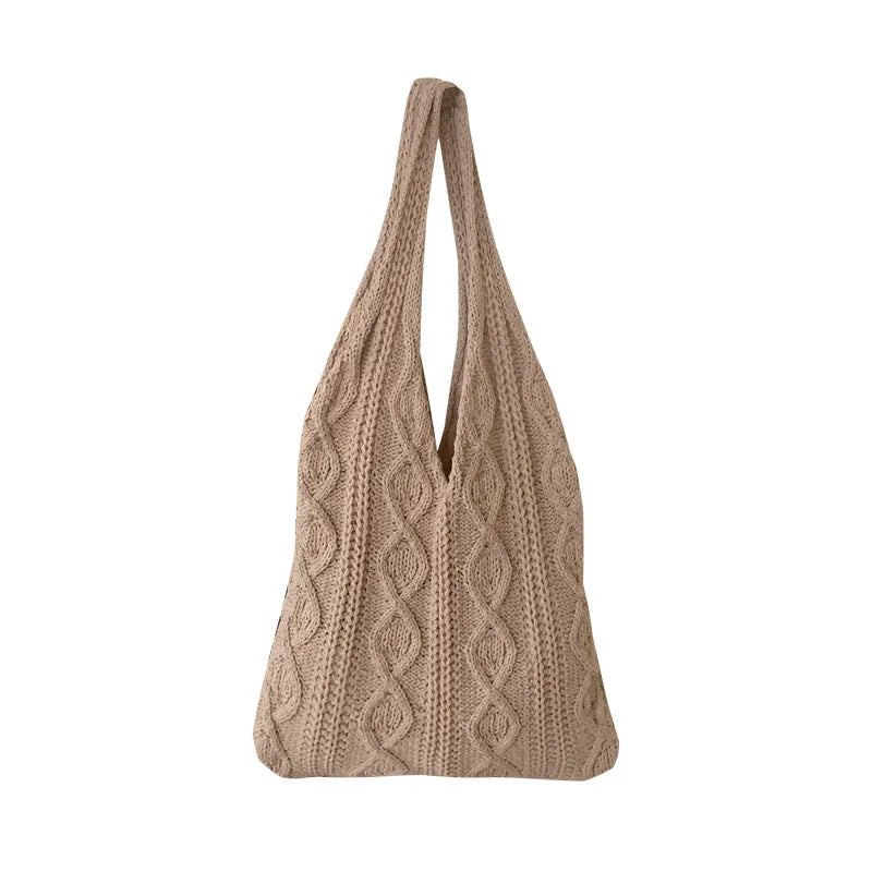 Retro hollow knitted polyester shoulder bag measuring 55cm by 37cm in solid colour with double straps