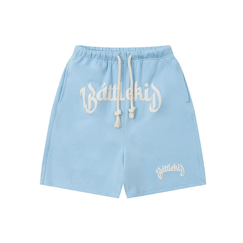 Cotton-blend cropped sweatpants shorts in loose street style with hip-hop retro aesthetic