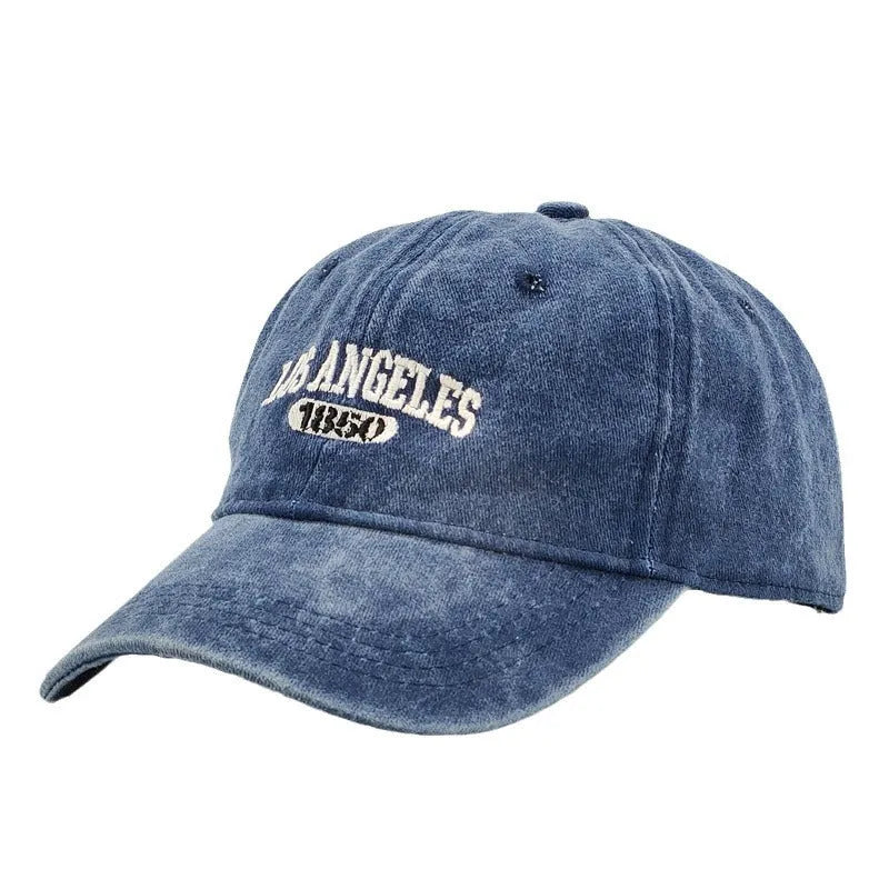 Retro personalised distressed acrylic peaked cap with embroidered letters, shown on adjustable strap.