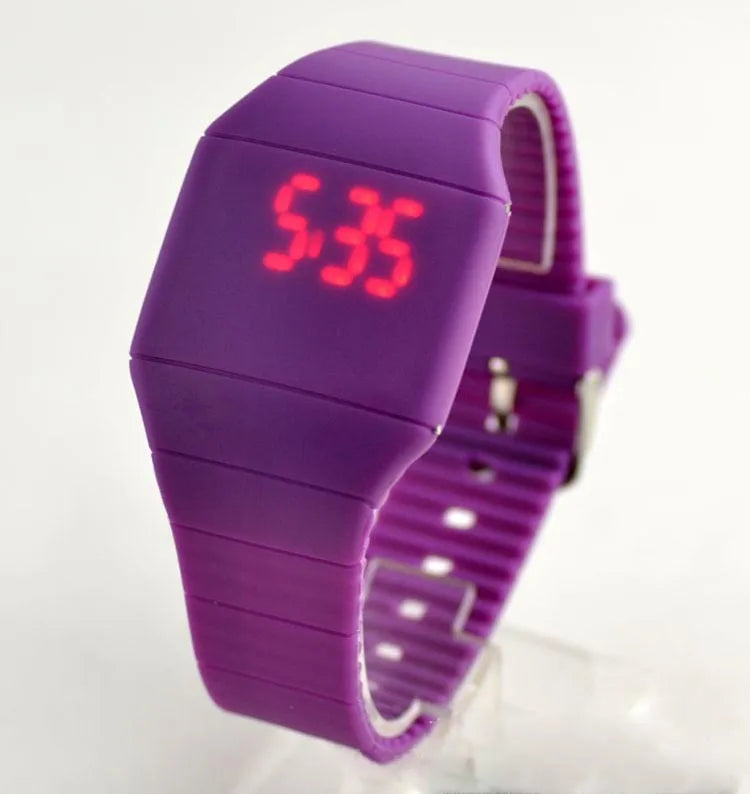 Square white electronic touch screen watch with digital display on a black PU strap and stainless steel buckle