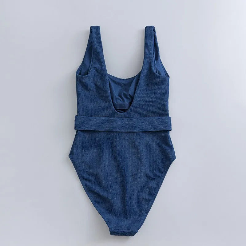 Navy blue women's one-piece slimming swimsuit with removable chest pads