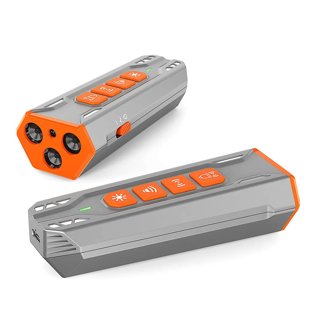 Handheld ultrasonic dog trainer with three sound heads in black and orange ABS plastic.