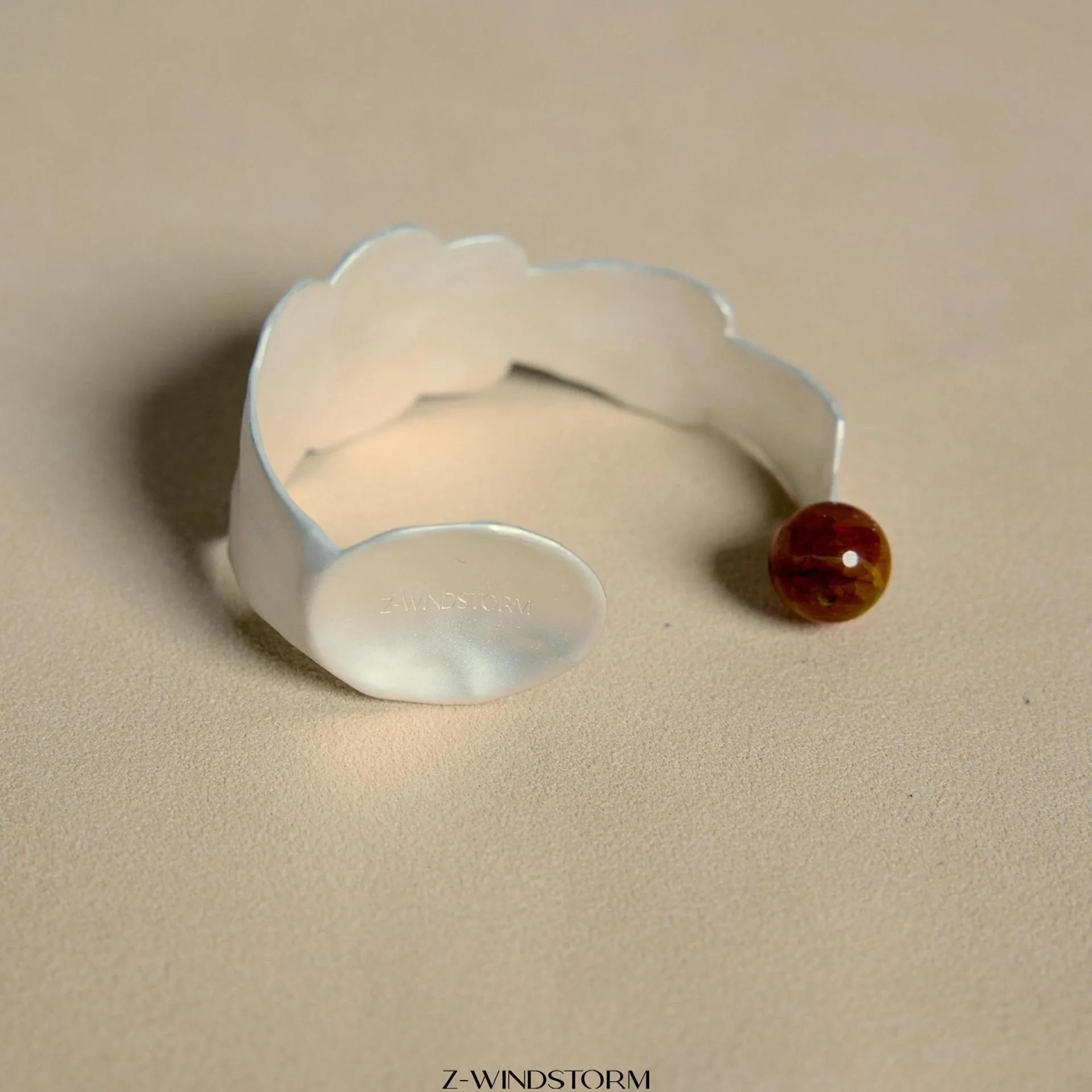 Small round spoon stewed pork jewellery set showing ring and bracelet with diamond-shaped electroplated alloy charms