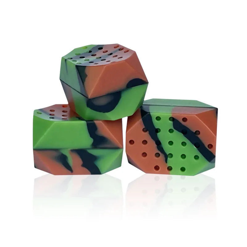 Transparent box containing two camouflage silicone facial muscle fitness balls for jaw exercise