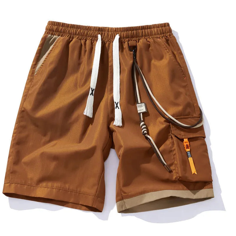 Men's loose-fit bamboo fibre shorts in coffee colour, showing straight-leg cropped design on a hanger.