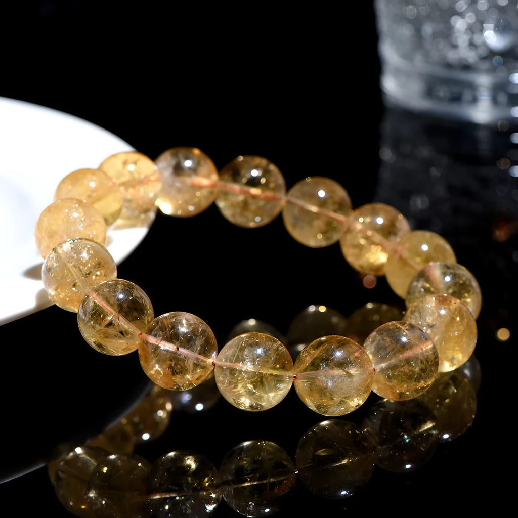 Natural yellow citrine bracelet with Asestelle beads in Brazilian yellow or violent yellow colour options.
