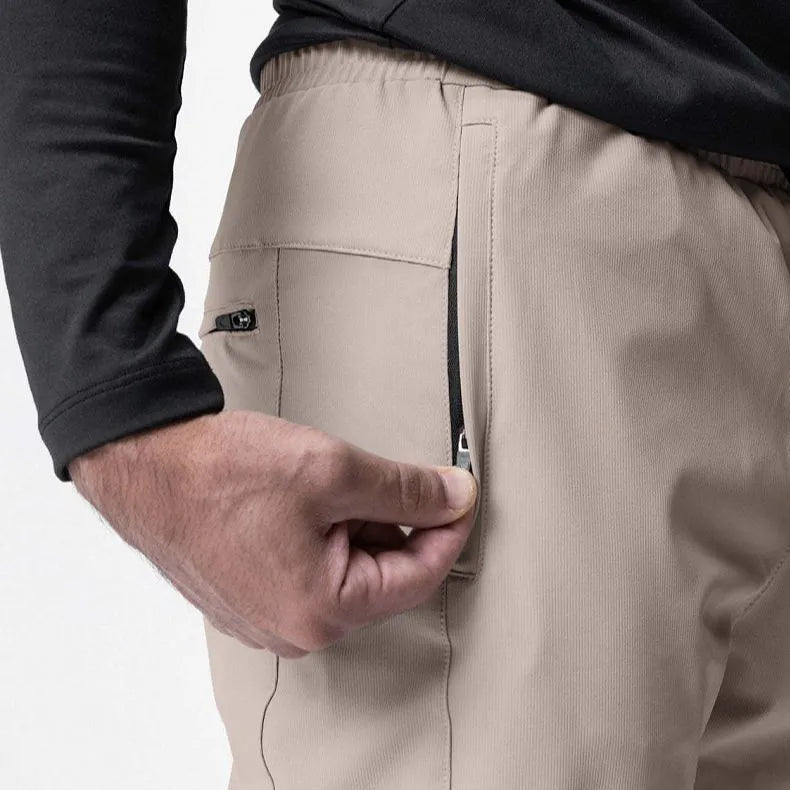 Men's loose-fit ankle-tied trousers in olive green, suitable for fitness and casual wear.