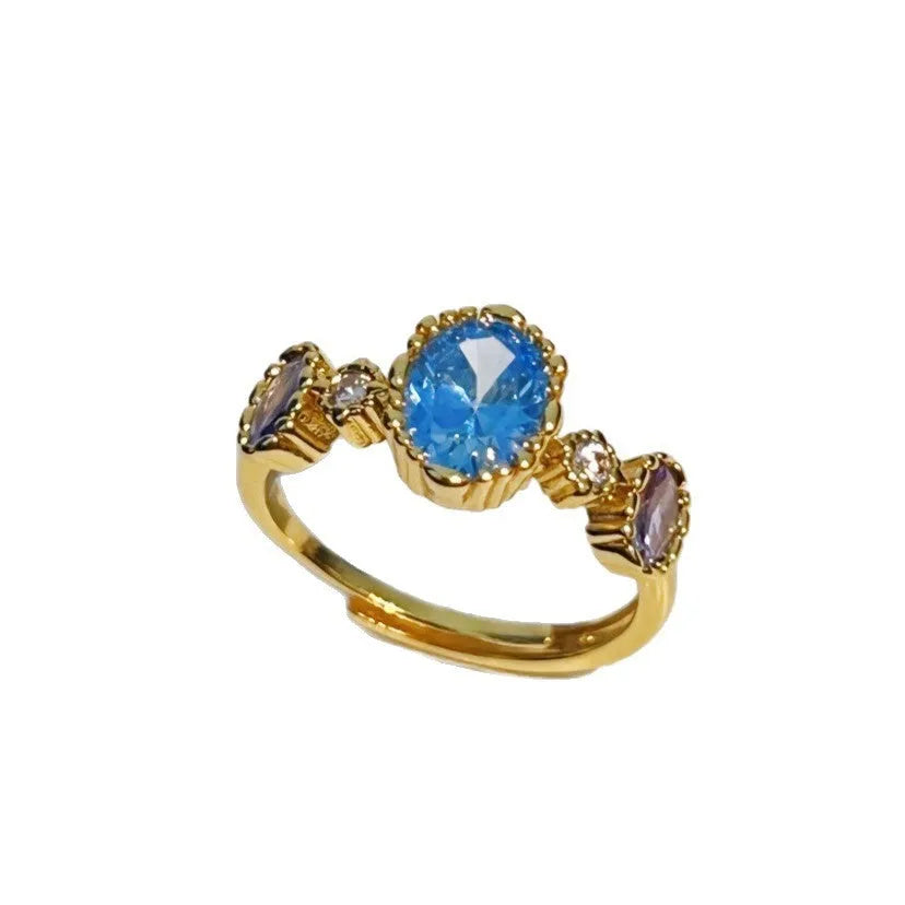 Vintage copper ring with blue gemstone and snowflake ice flower design