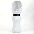 Silicone folding dog water cup shown in mint green colour, unfolded and flat.
